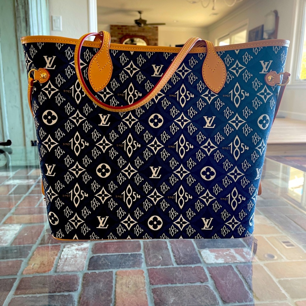 Authentic Louis Vuitton 1854 Neverfull MM with pouch. New